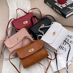 A small square bag with diamond-shaped stripes