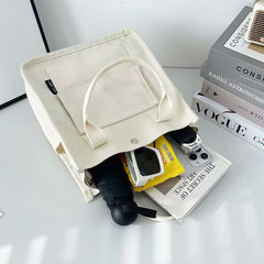 Canvas three-dimensional multi-pocket tote handbag