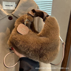 Carry a small crossbody bag