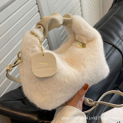 Carry a small crossbody bag
