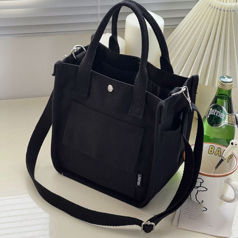 Canvas three-dimensional multi-pocket tote handbag