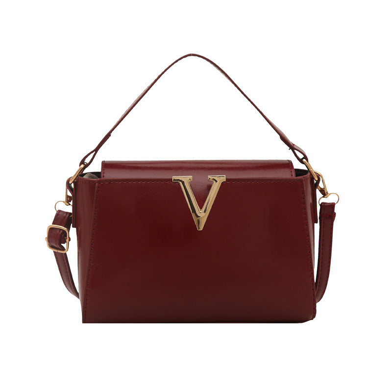 Outward appearance: Handheld single-shoulder crossbody handbag