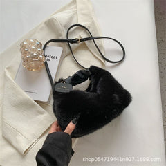 Carry a small crossbody bag